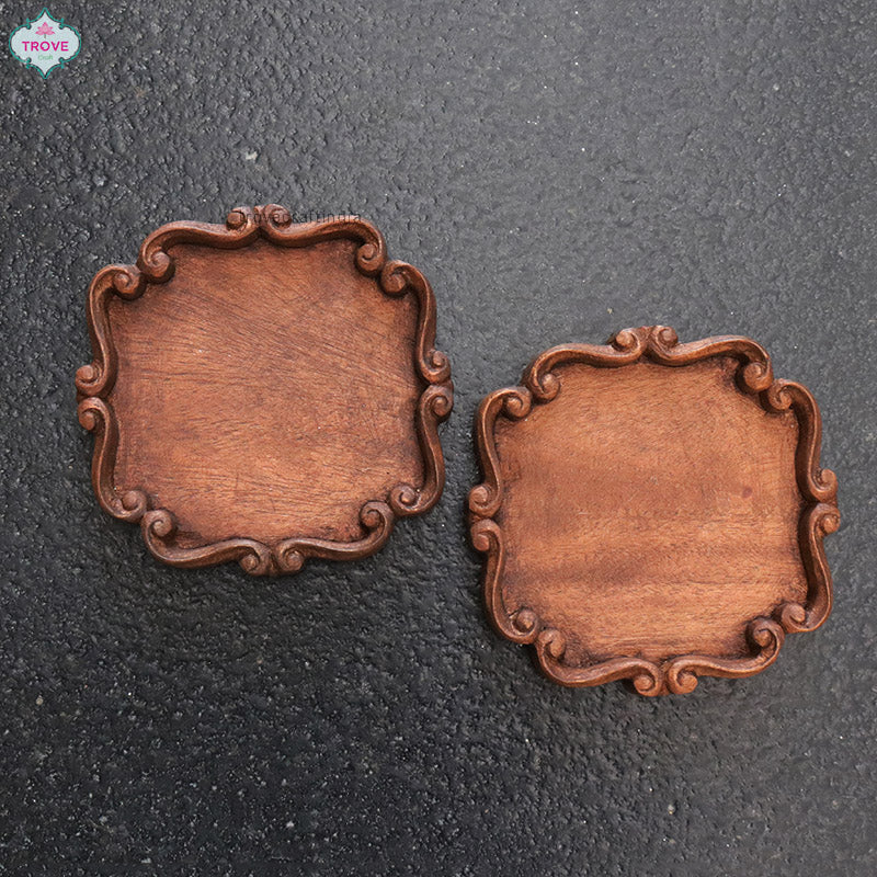Set of 2 carved wooden coasters / plaques