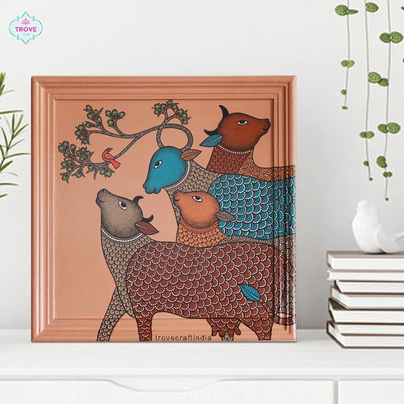 Hand-painted cows in  Gond art 