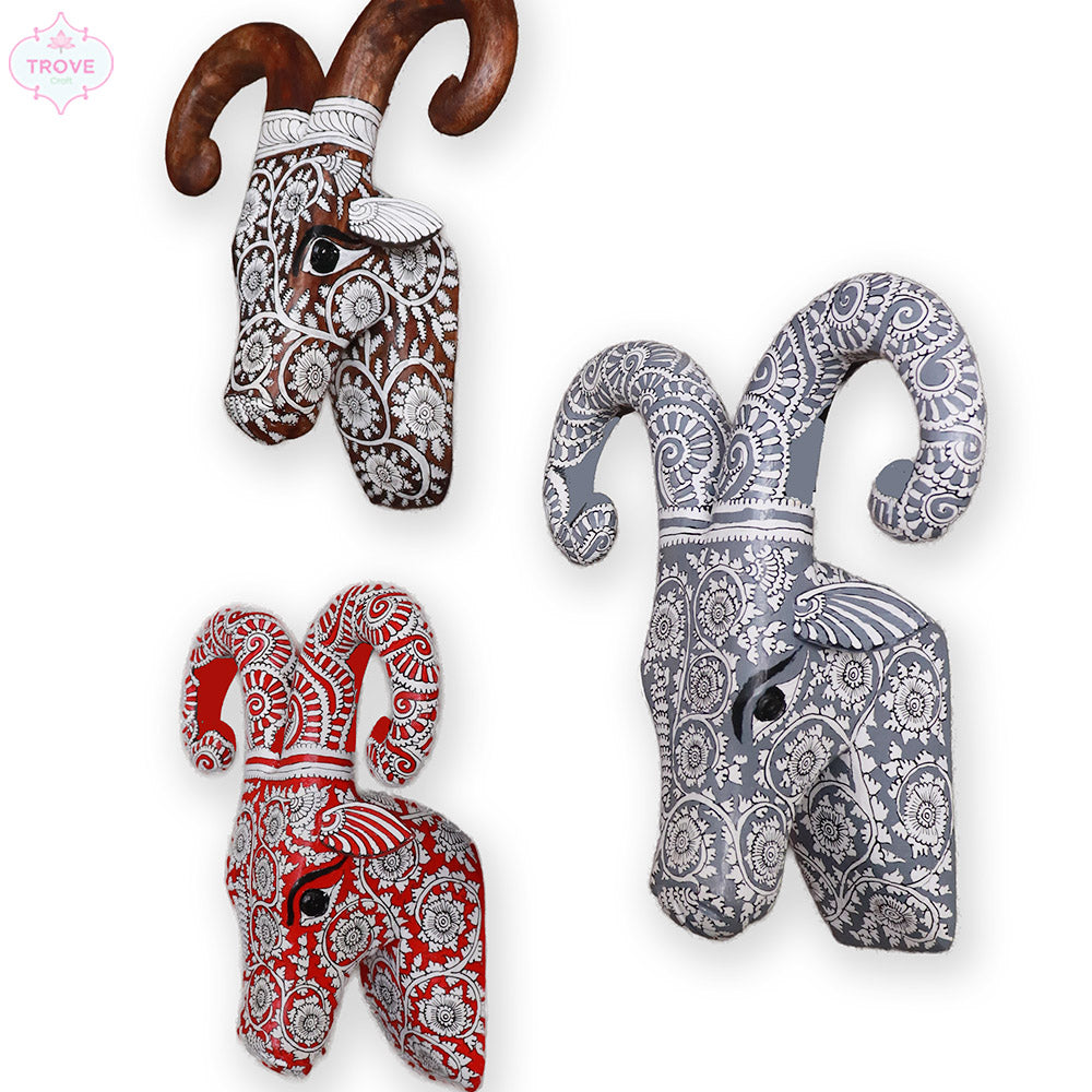 wooden painted Ram heads 