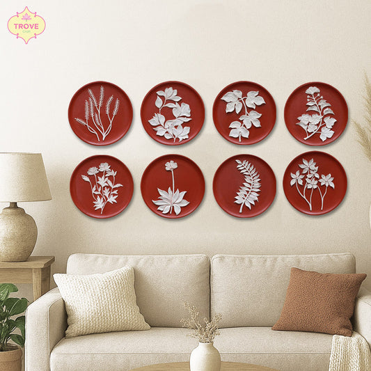 terracotta round decorative wall plates with white botanical relief art