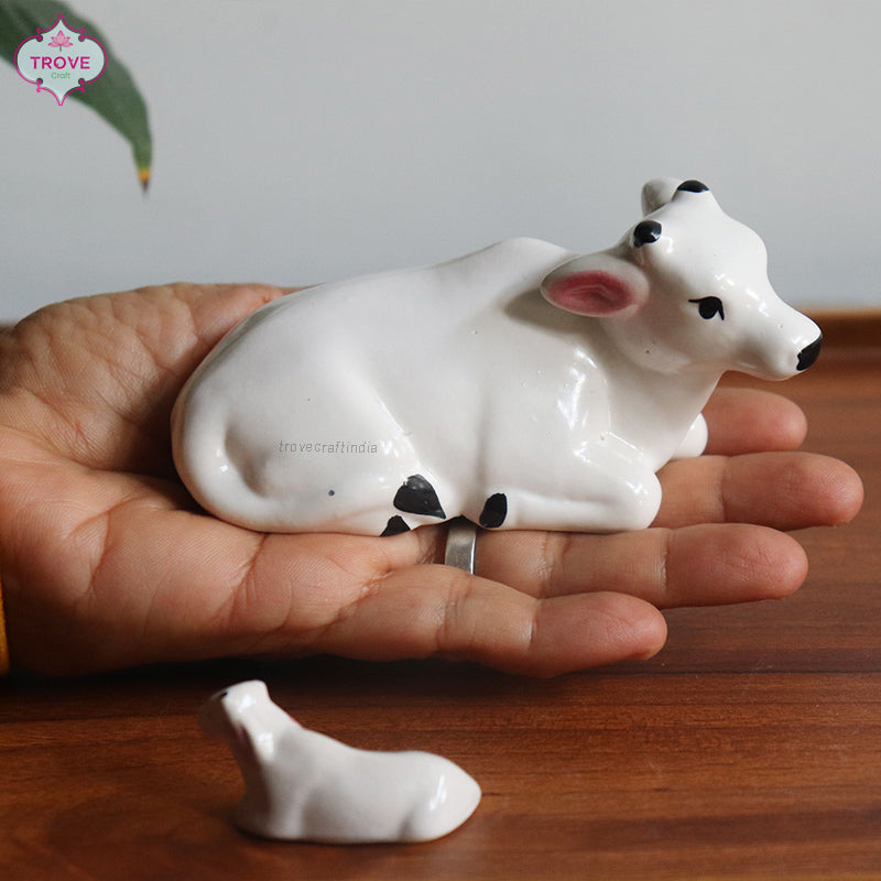 Set of miniature ceramic sitting Mother Cow and calf