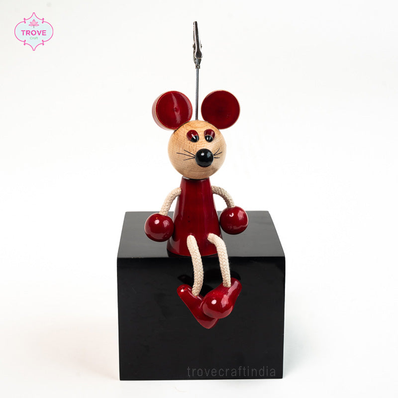 red wooden mouse figurine with clip holder