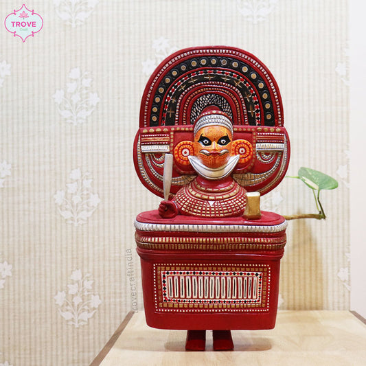 wooden decor figurine of a traditional theyyam performer