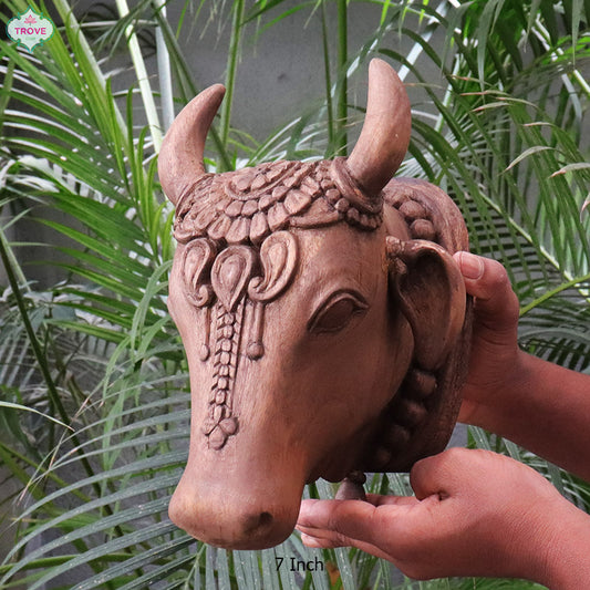 Carved wooden cow head