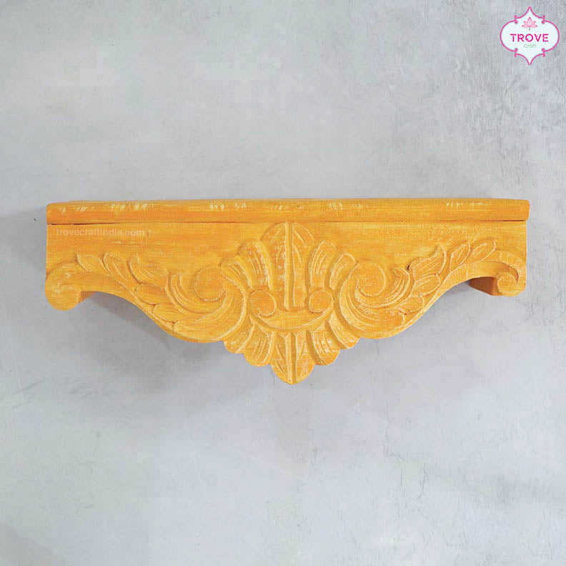 Carved wall shelves