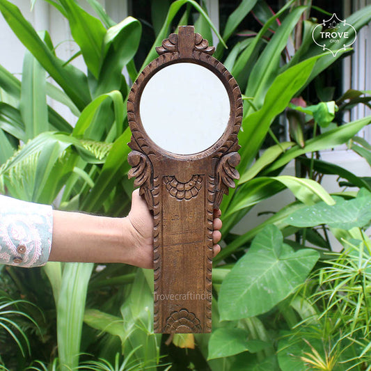 Wooden carved coconut grater-style mirror frame