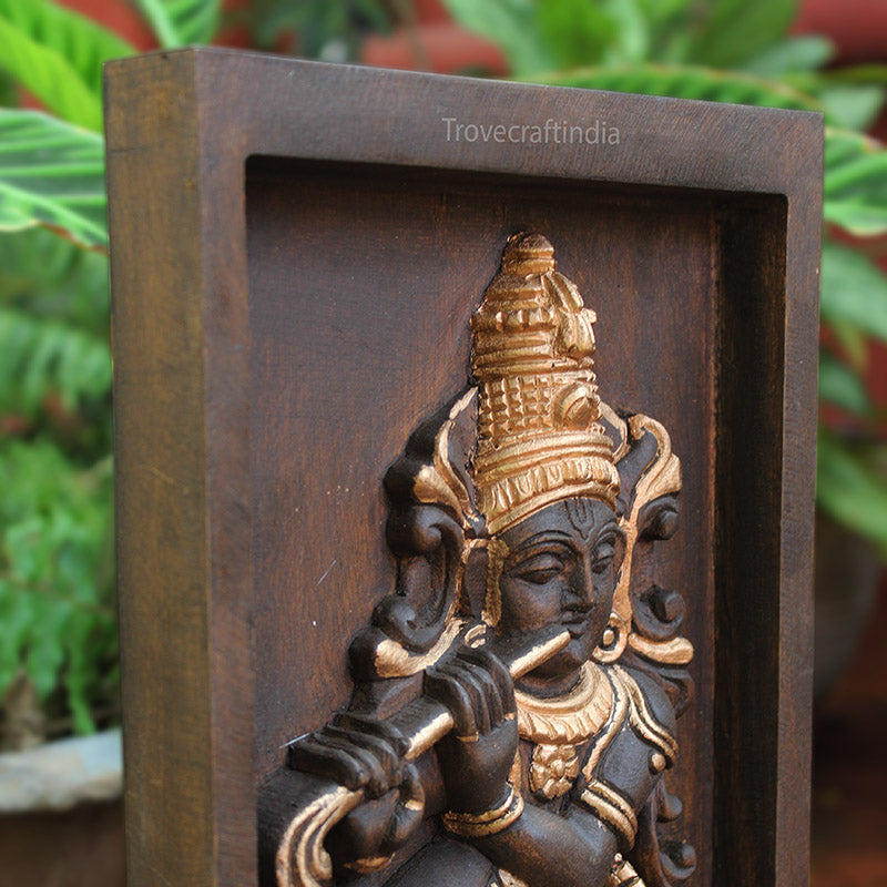 wooden krishna idol